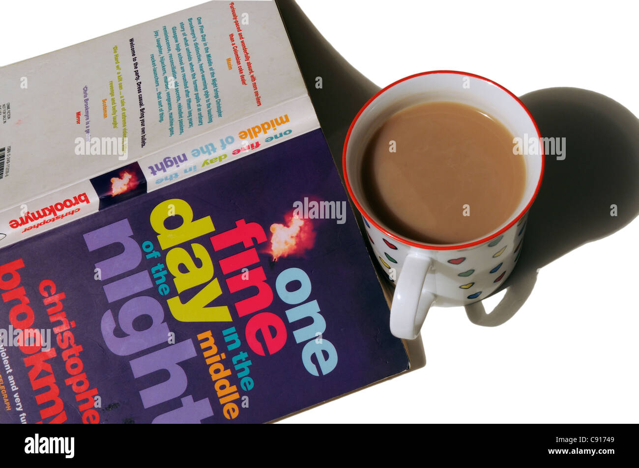 One Fine Day in the Middle of the Night by Christopher Brookmyre with a mug of tea Stock Photo