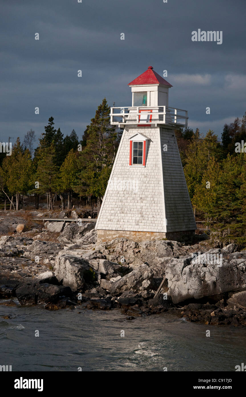 A ray of sunlight strikes the lighthouse at South Baymouth, Manitoulin