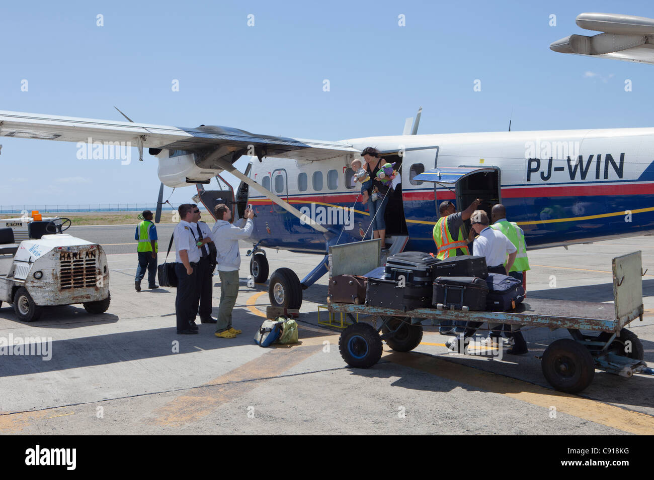 Sint Maarten, Caribbean island, Netherlands since 2010. Philipsburg. Twinotter arriving at Princess Juliana Airport. Stock Photo