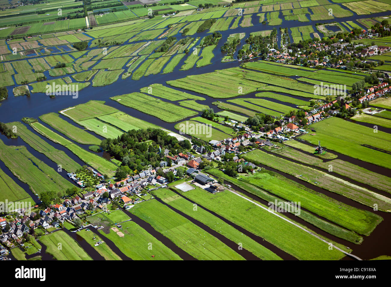 Netherlands, Wormer, Polder with village and farmland. Aerial. Stock Photo