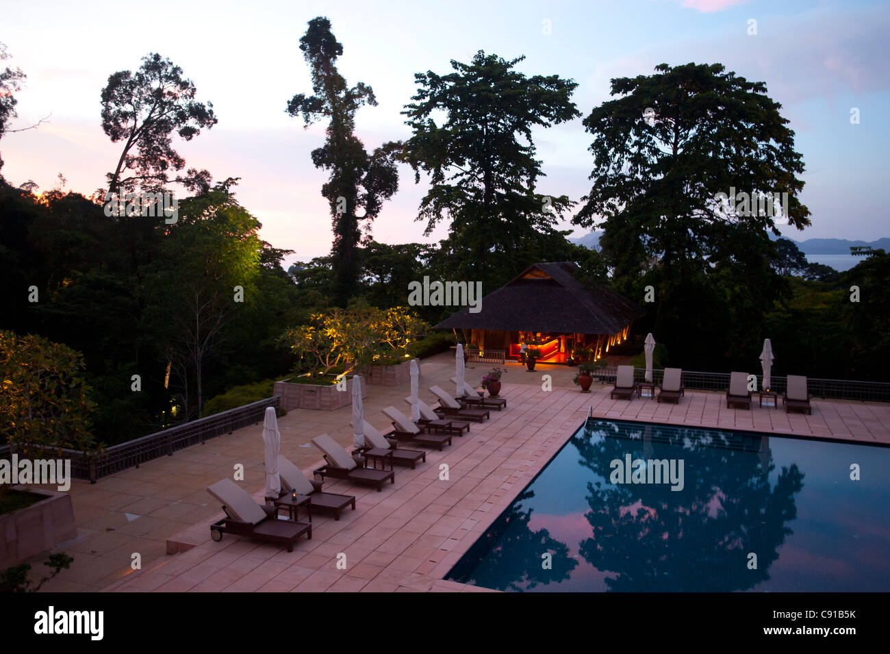 Pool and Thai restaurant in the evening, Datai Resort, Lankawi Island, Malaysia, Asia Stock Photo