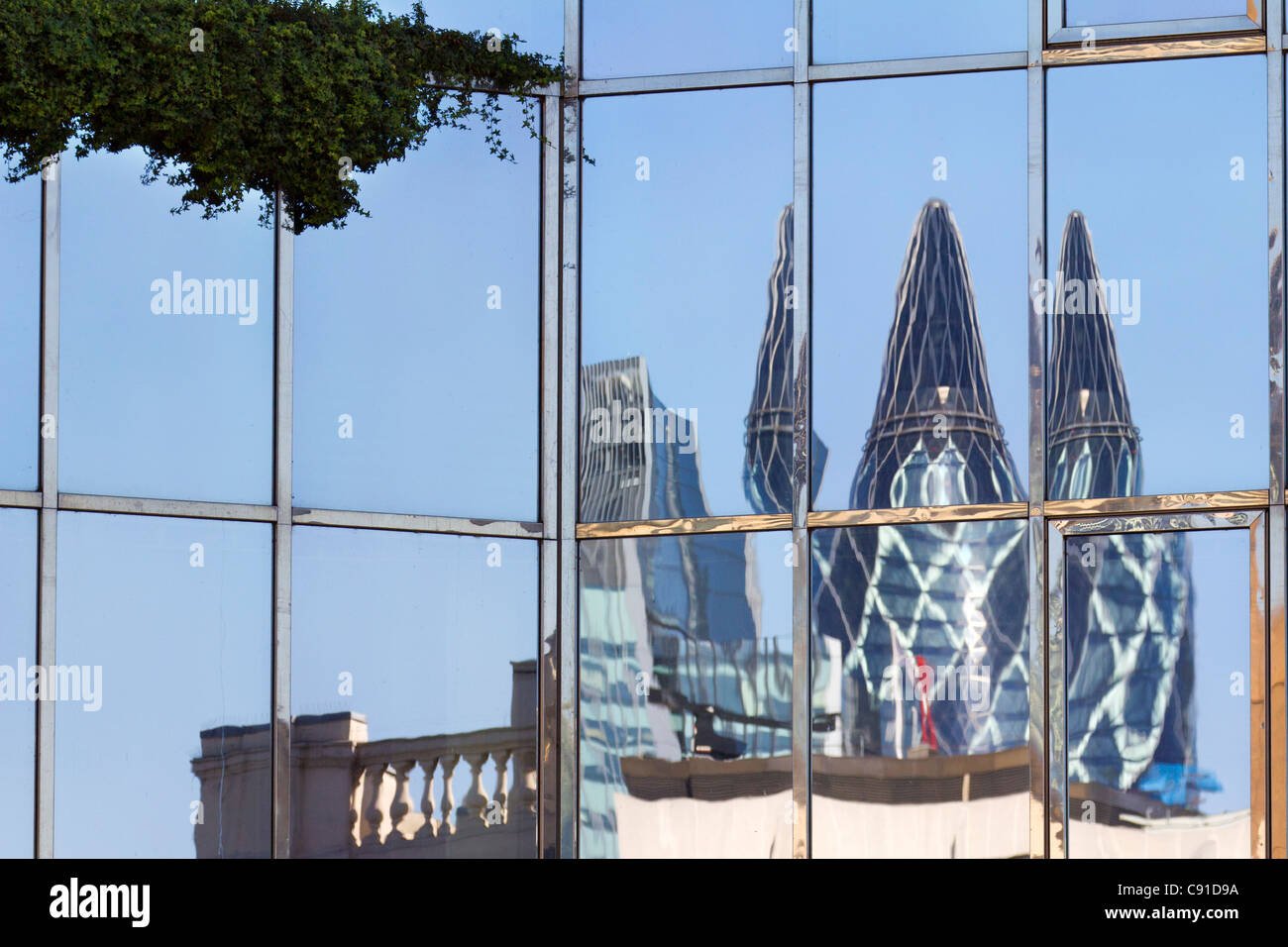 Reflection of the Gherkin in a London Bridge office building Stock Photo