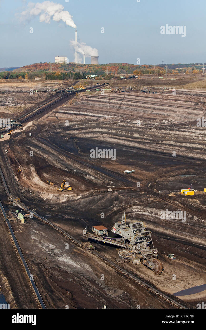 Aerial view of a bucket-wheel excavator with conveyor belt in for open-pit lignite mining brown coal Schoeningen Lower Saxony Ge Stock Photo