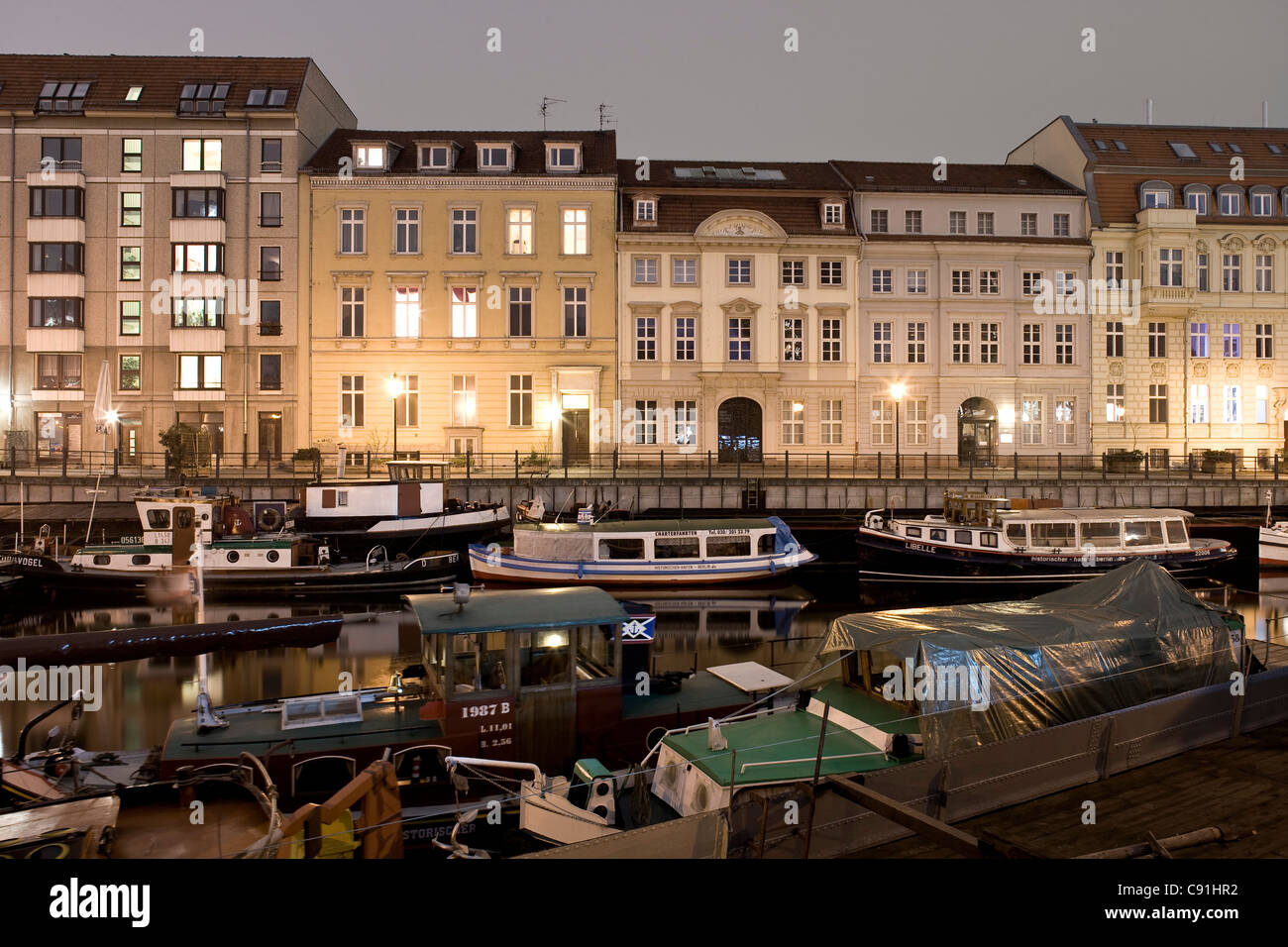 Houses and boats in the evening, Maerkisches Ufer, Berlin, Germany, Europe Stock Photo