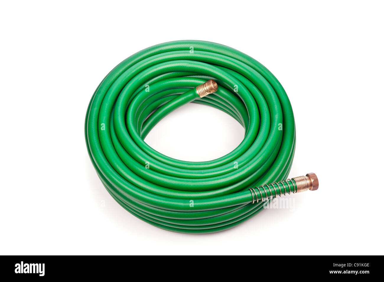A new green coiled rubber hose on a white background. Stock Photo