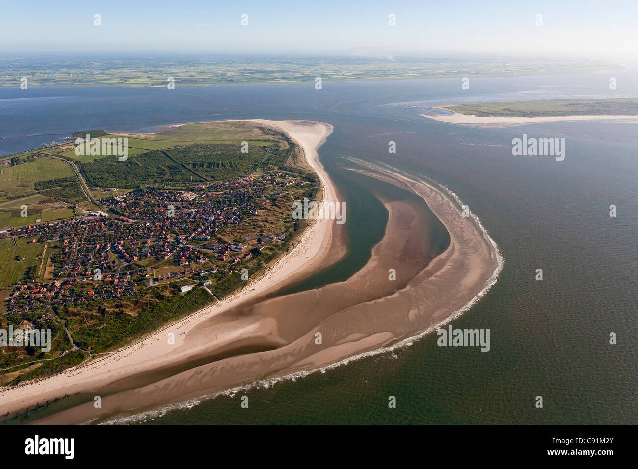 Aerial of North Sea island, Spiekeroog and mainland in background, Lower Saxony, Germany Stock Photo