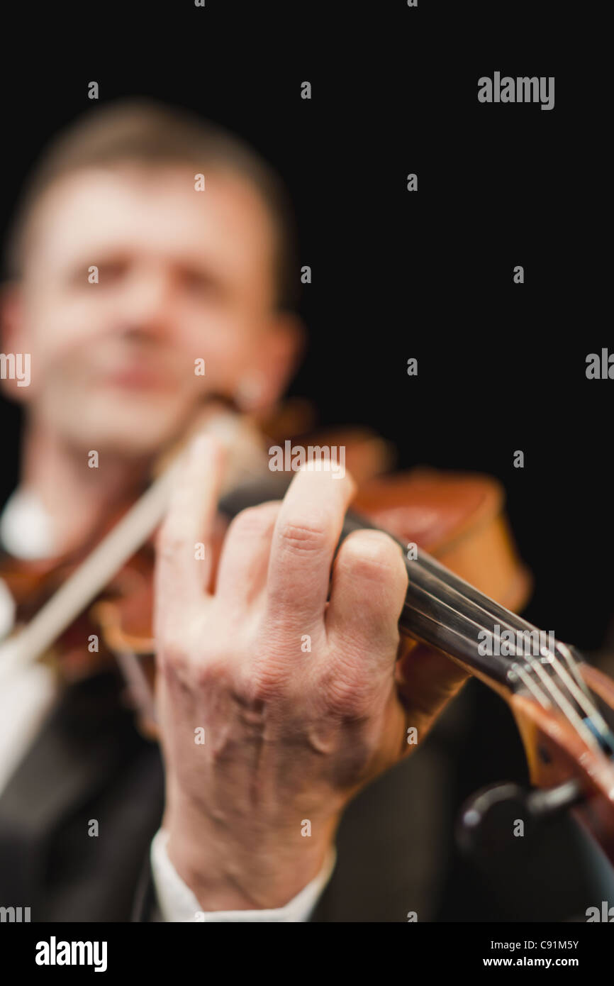 Violin player in orchestra Stock Photo Alamy