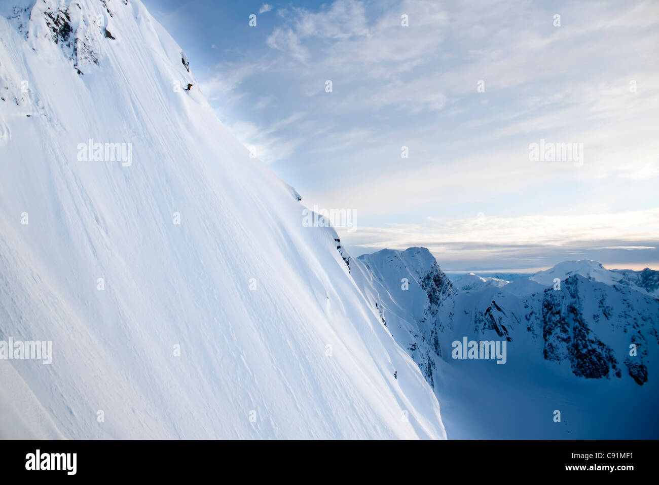 Man Skiing Steep Powder On The Southwest Face Of Kickstep Mountain Turnagain Pass Kenai Mountains In Southcentral Alaska Stock Photo Alamy