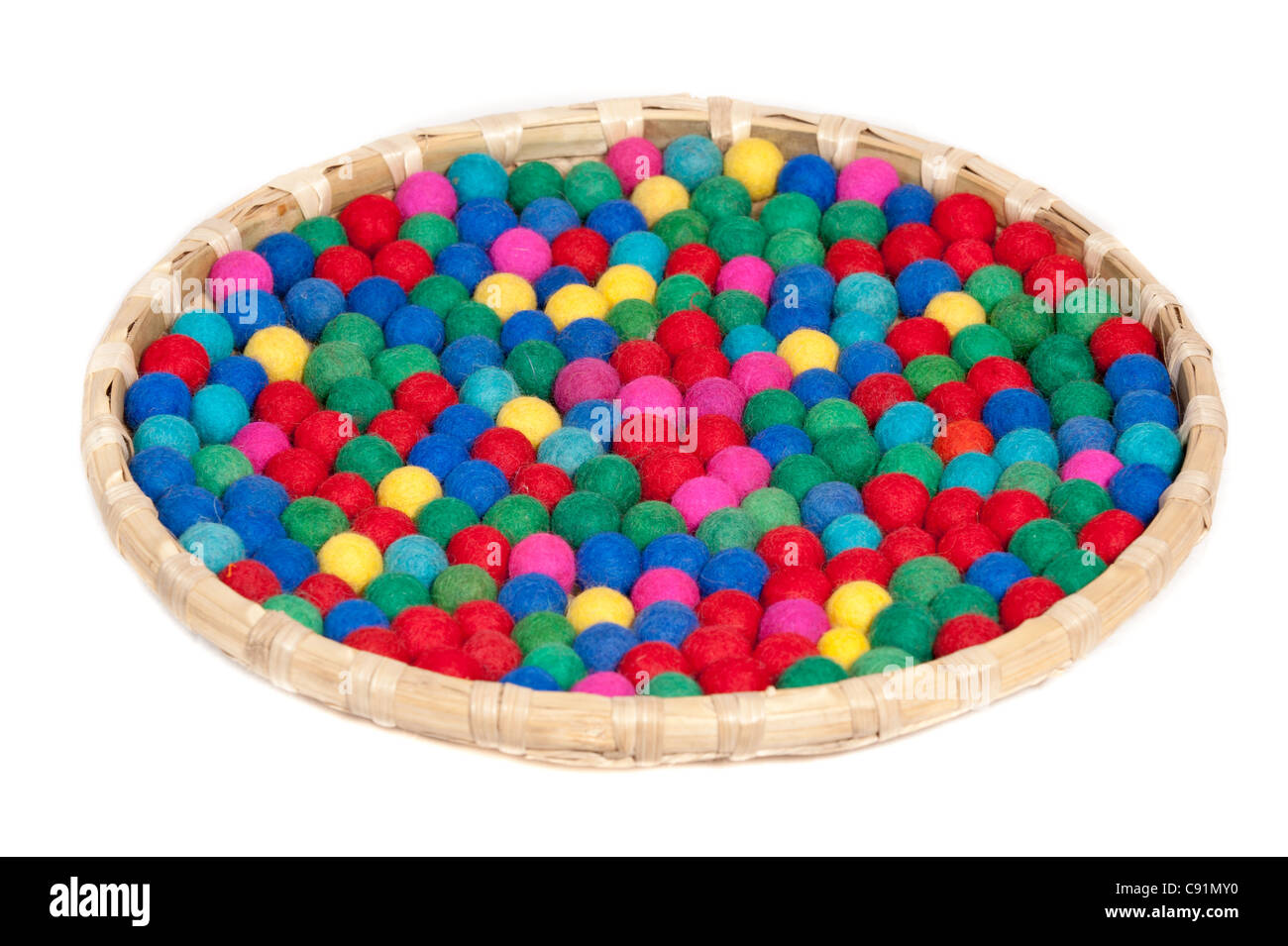 Colorful bobbles in tray Stock Photo