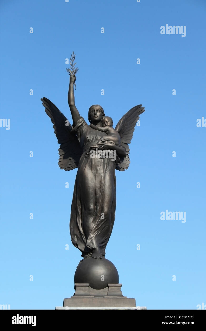 Angel and baby statue Stock Photo Alamy