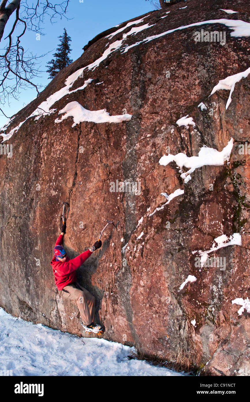 Man Dry Tool Rock Climbing At Pivot Point On A Snowy Rock Seward Highway Along Turnagain Arm Near Anchorage Alaska Stock Photo Alamy