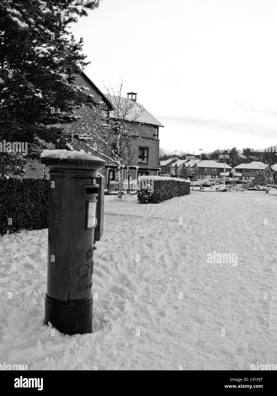 post box in suburbia winter 2010 Stock Photo