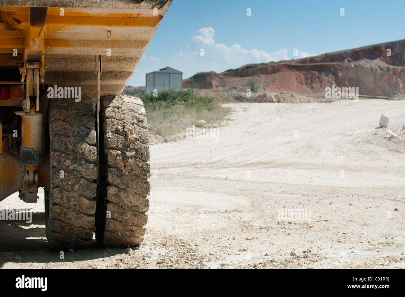Truck in the quarry. Close up tire and trailer Stock Photo Alamy