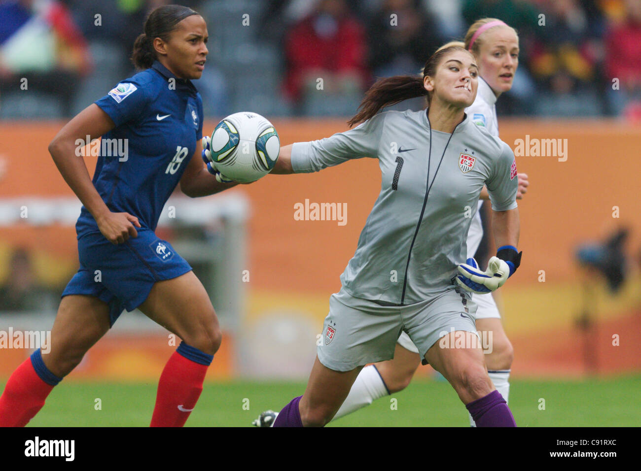 United States goalkeeper Hope Solo throws the ball during the 2011 FIFA Women's World Cup semifinal soccer match against France. Stock Photo