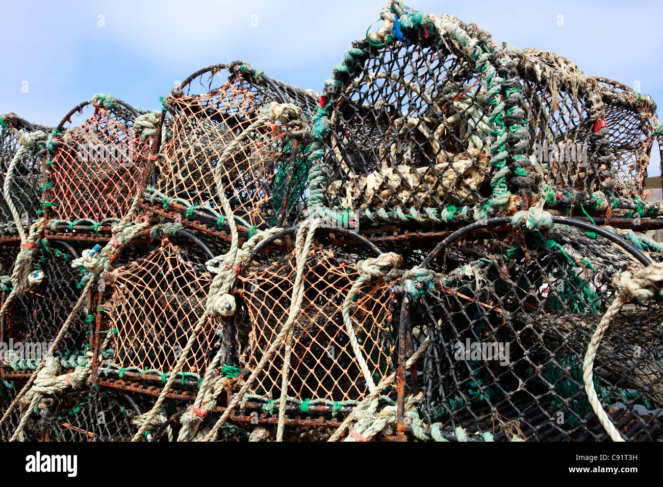 Lobster pots on the quay at Stromness on Orkney, Scotland. Stock Photo