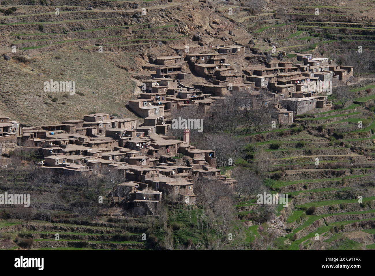 Berber village of Tamguist at the Imenane River in the High Atlas Mountains, Morocco. Stock Photo