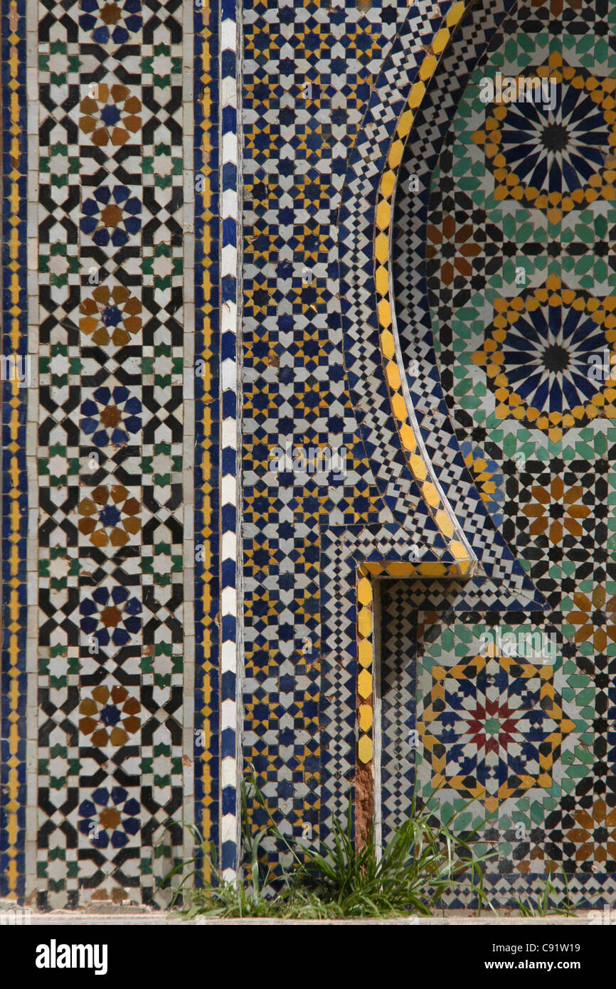 Zellige tileworks covered a fountain next to the Mausoleum of Moulay Ismail in Meknes, Morocco. Stock Photo