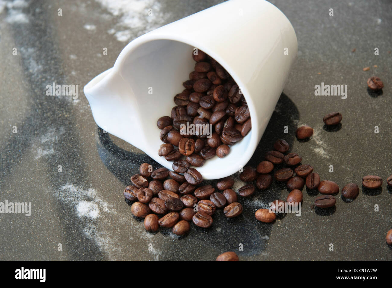 white circle and black coffee beans Stock Photo