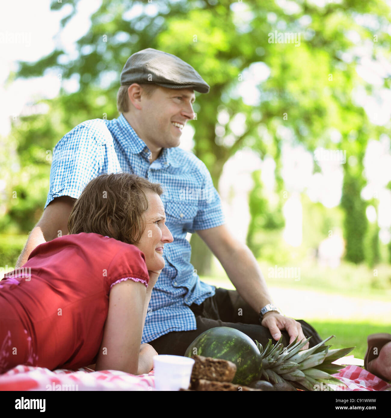 Couple having picnic together Stock Photo