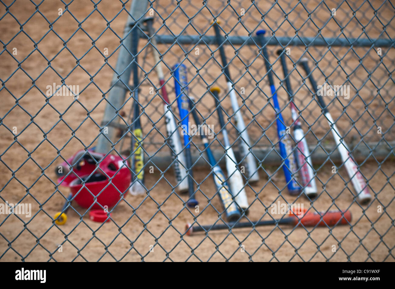 Youth softball baseball game. Bats Stock Photo Alamy