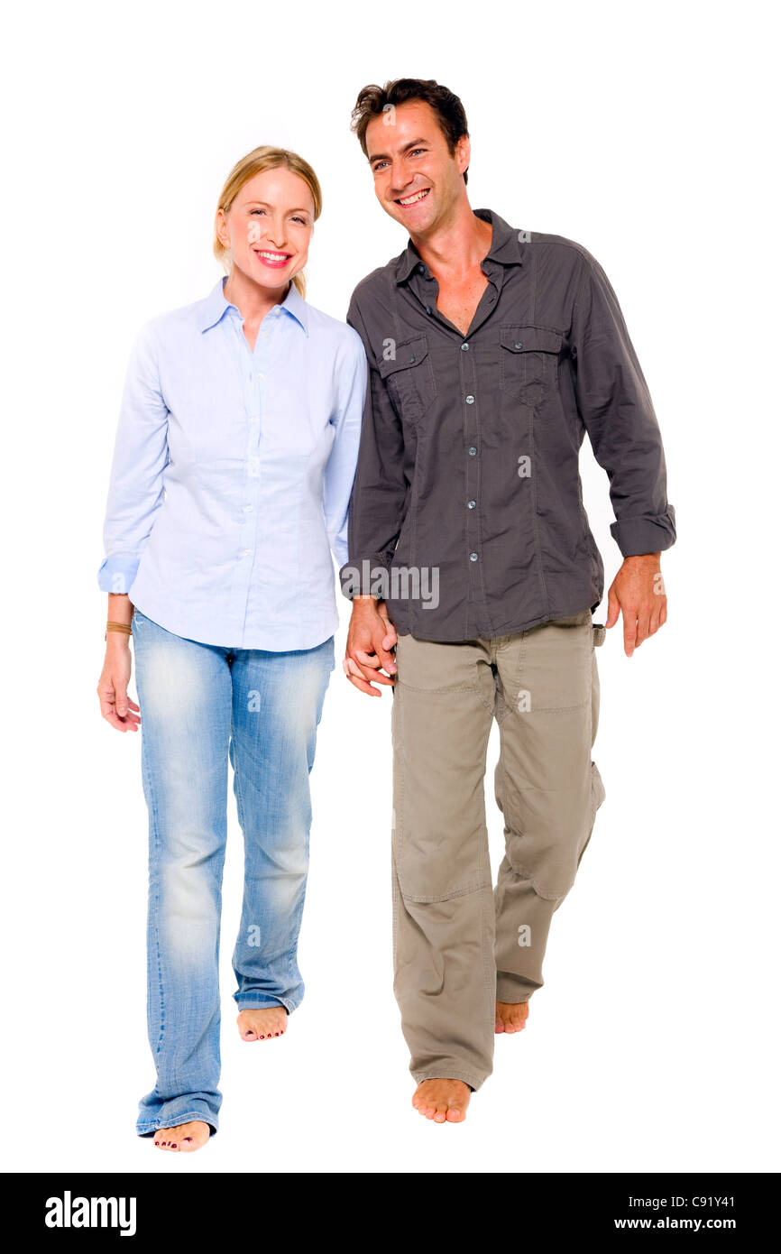 couple walking hand in hand Stock Photo - Alamy