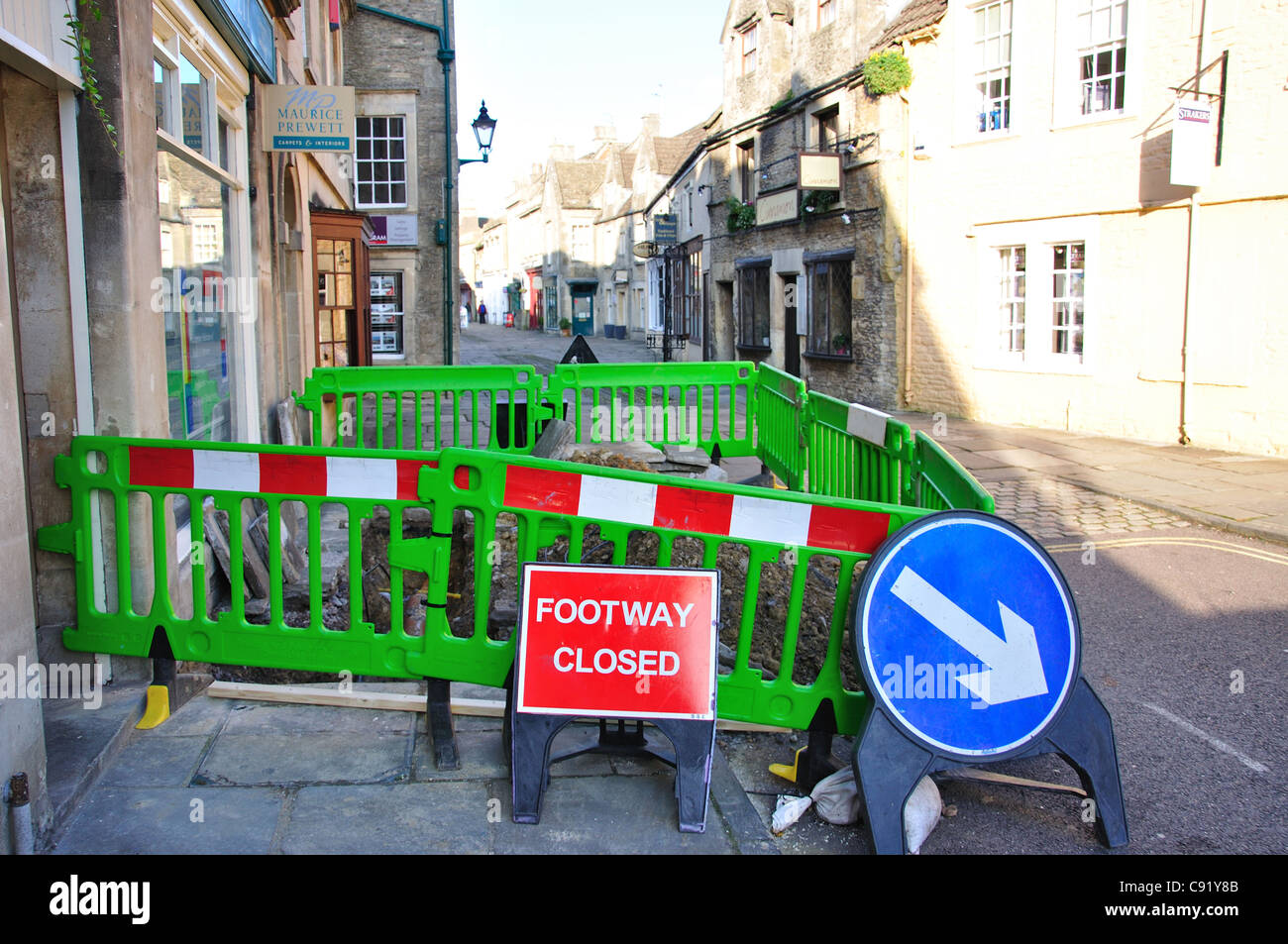 Footpath repairs, High Street, Corsham, Wiltshire, England, United