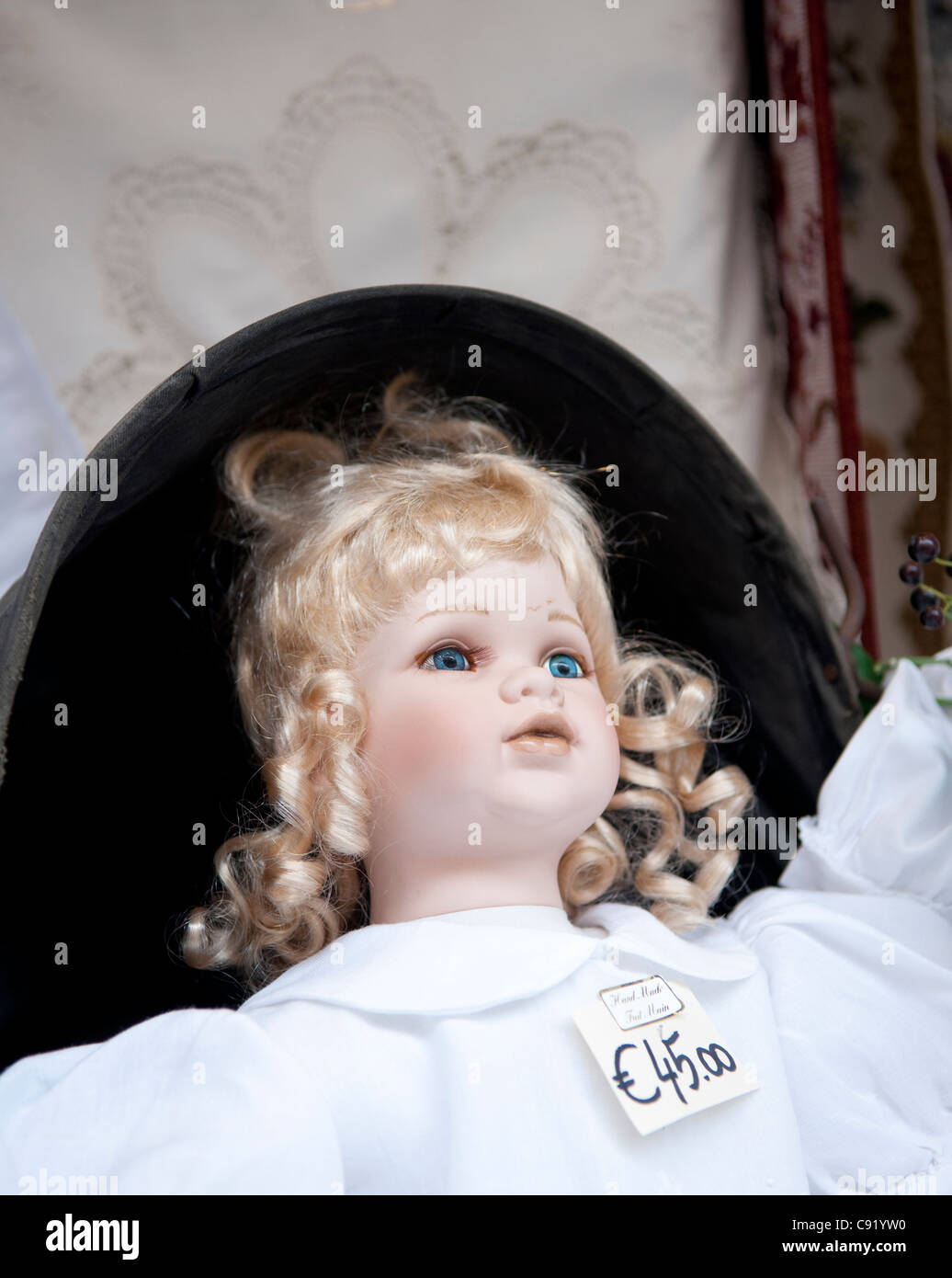 There are many traditional shops in Bruges selling gifts and handmade crafts. Porcelain dolls and lace can be purchased in many Stock Photo