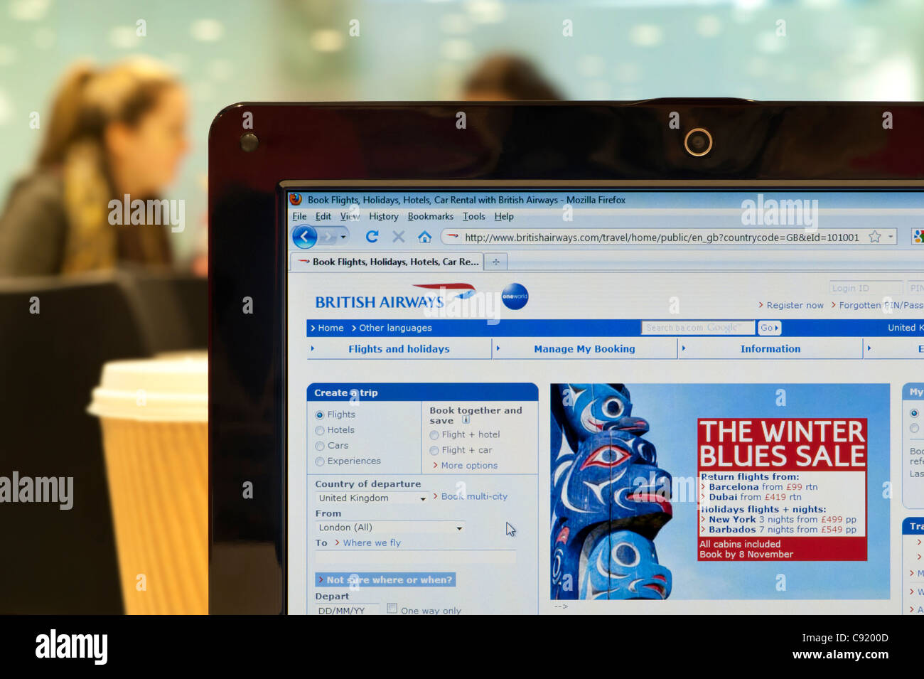 The British Airways website shot in a coffee shop environment ...