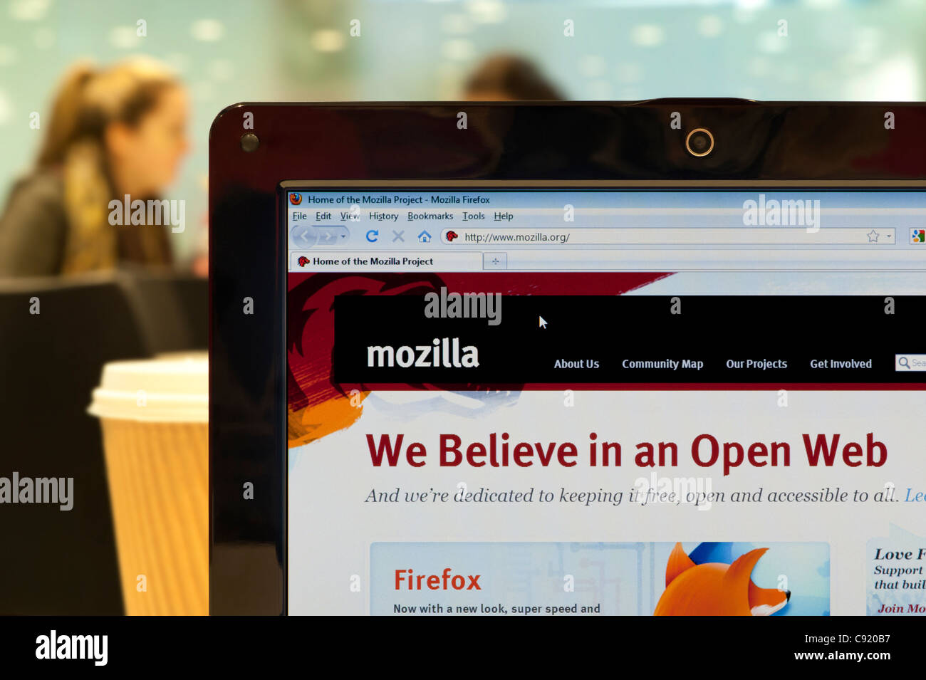 The Mozilla website shot in a coffee shop environment (Editorial use only: print, TV, e-book and editorial website). Stock Photo