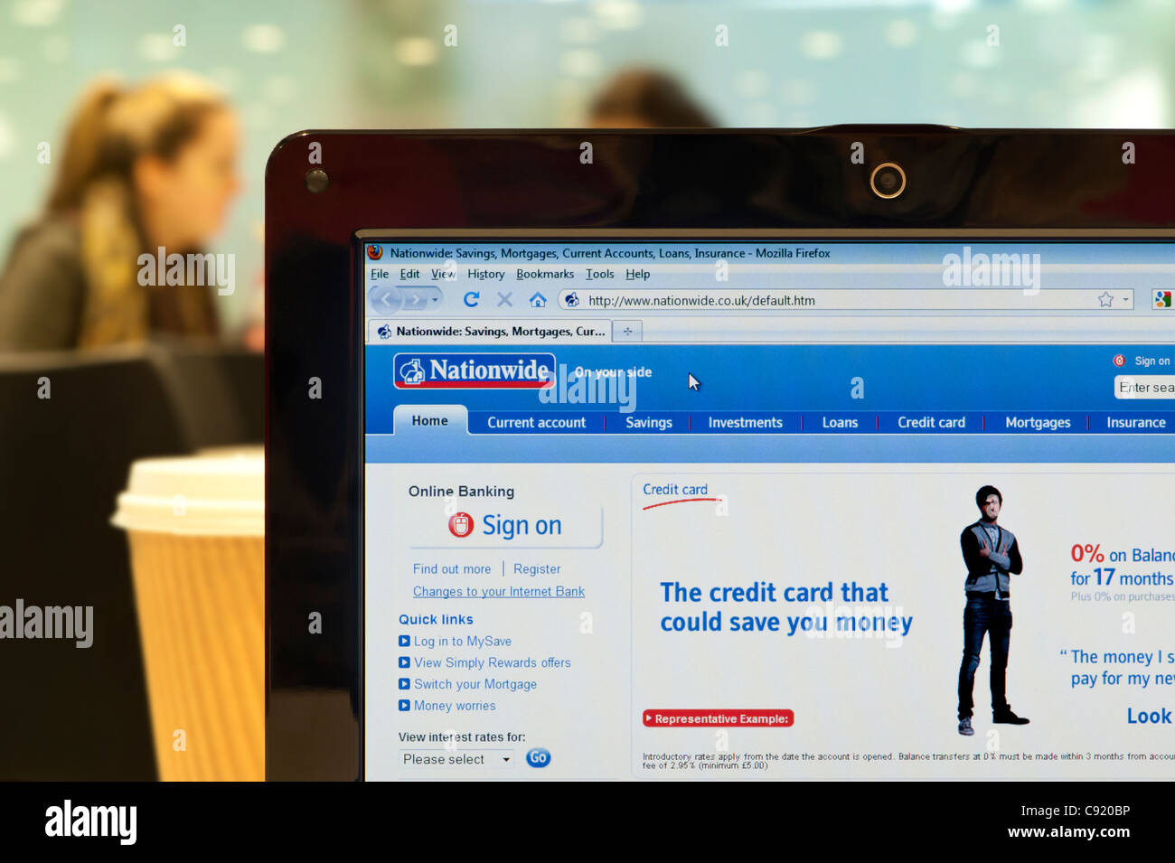 The Nationwide website shot in a coffee shop environment (Editorial use only: print, TV, e-book and editorial website). Stock Photo