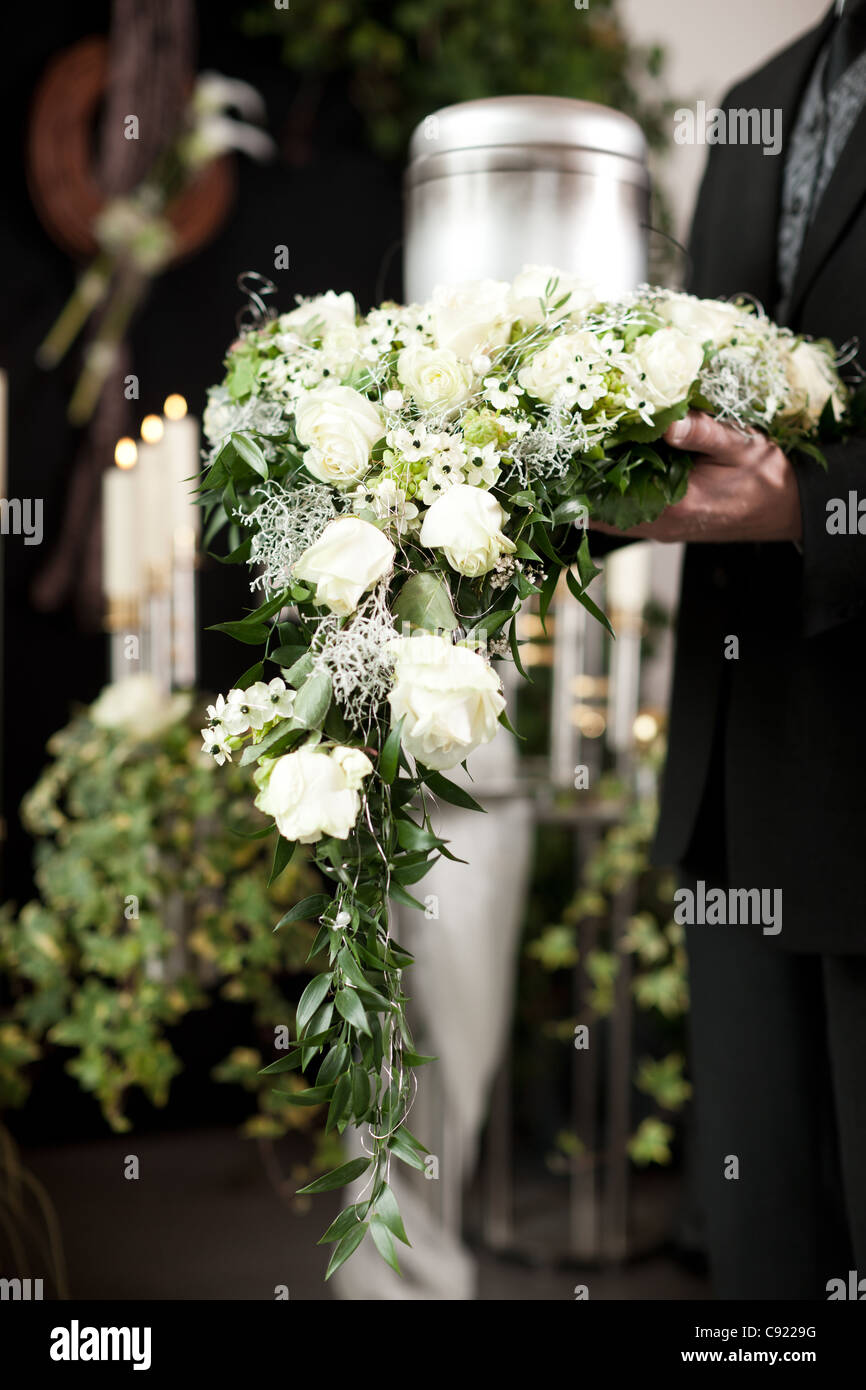 Religion, death and dolor  - funeral and cemetery; urn funeral Stock Photo