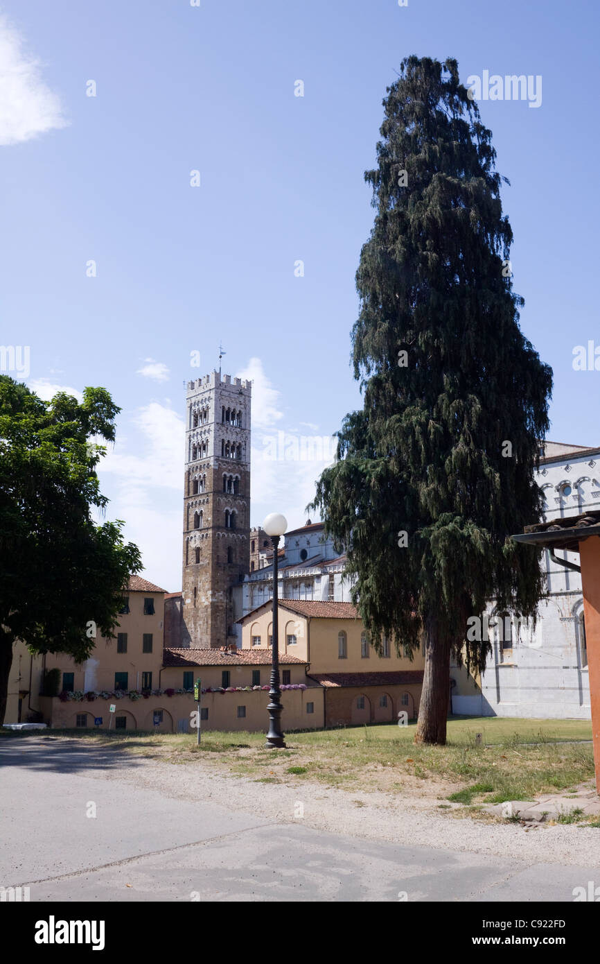 The tower of Tempietto Del Volto Santo can be seen from the Viale Delle Urbane in Lucca town. Tuscany, Italy. Stock Photo