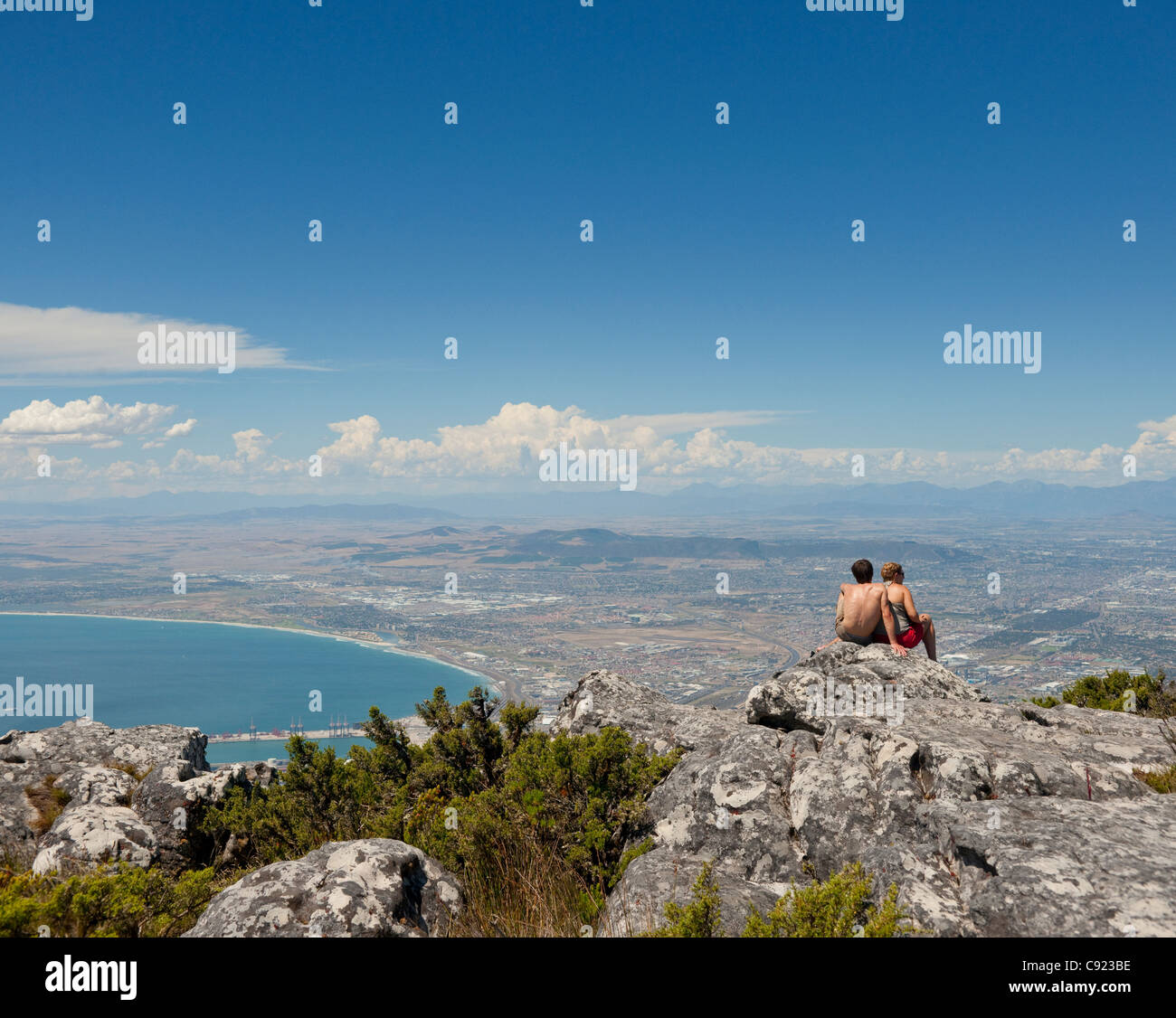 Lookout positions at the top of Table Mountain in Cape Town afford visitors striking views of the city below and across the Stock Photo