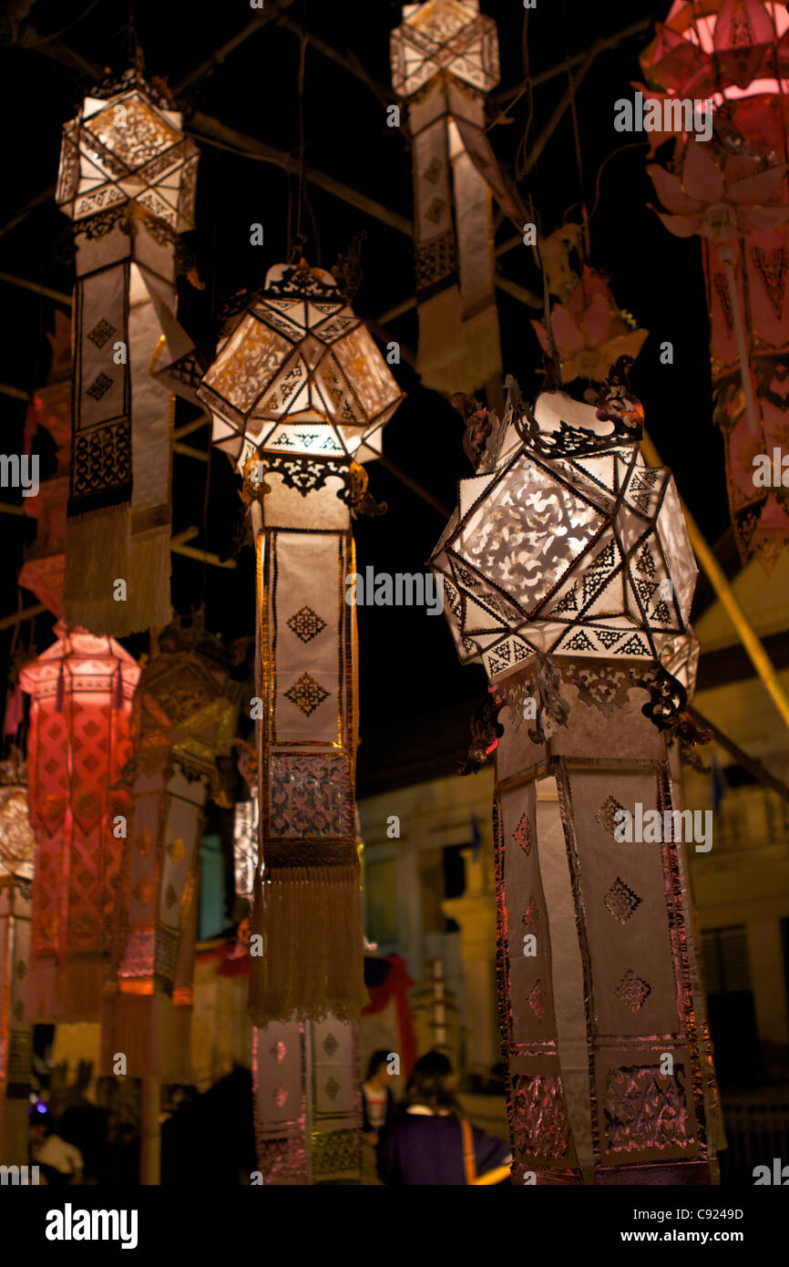 Delicate paper lanna lanterns are made and displayed on the streets at the November festival of Loy or Loi Krathon known Stock Photo