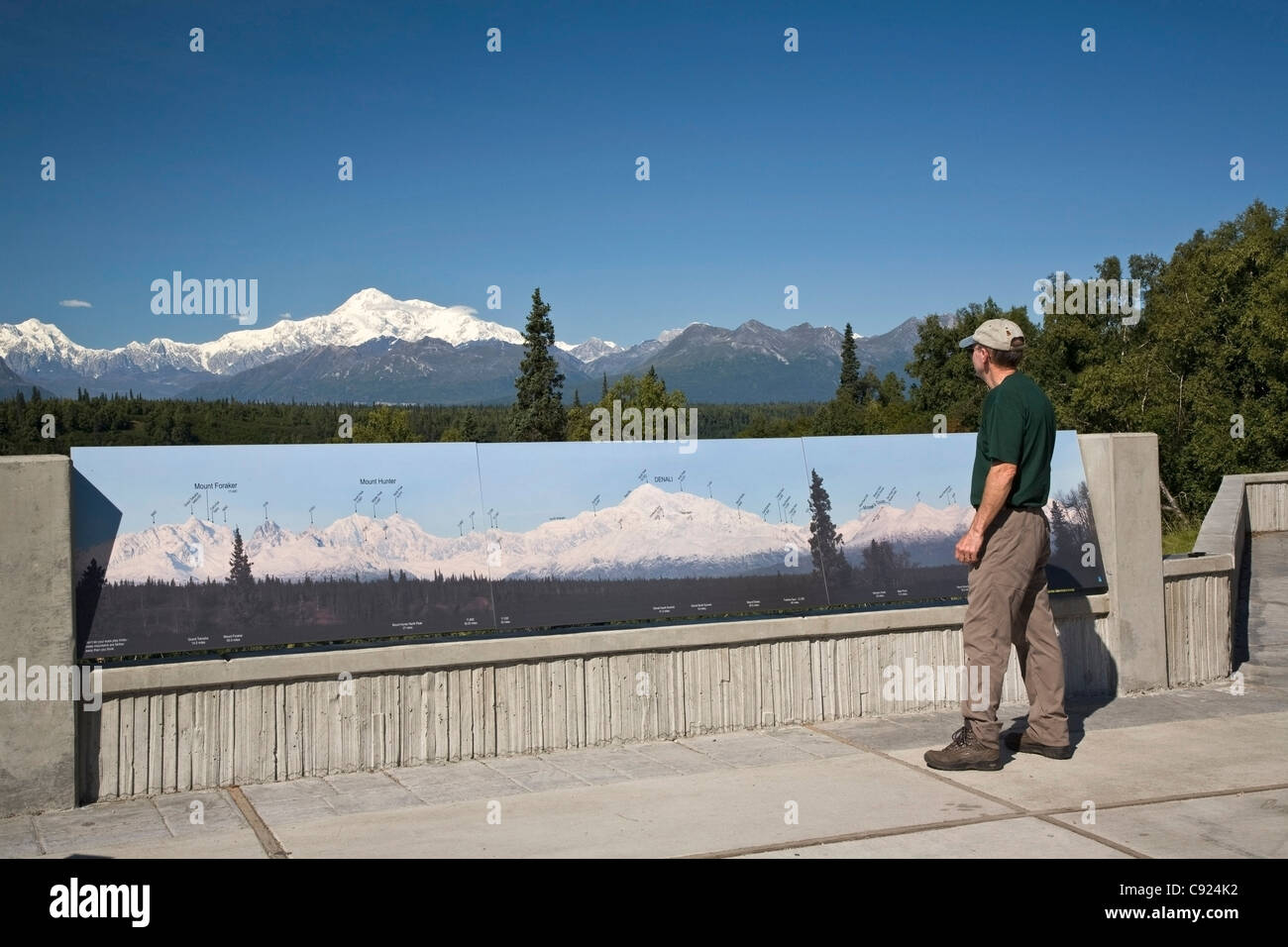 Man viewing Mt. Mckinley from Denali Viewpoint South at Denali State