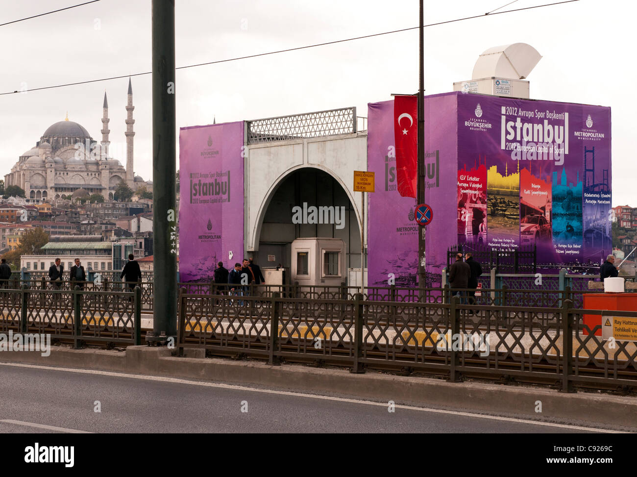 "Istanbul 2012 European Capital of Sport" sign on the Galata Bridge, Istanbul, Turkey Stock Photo