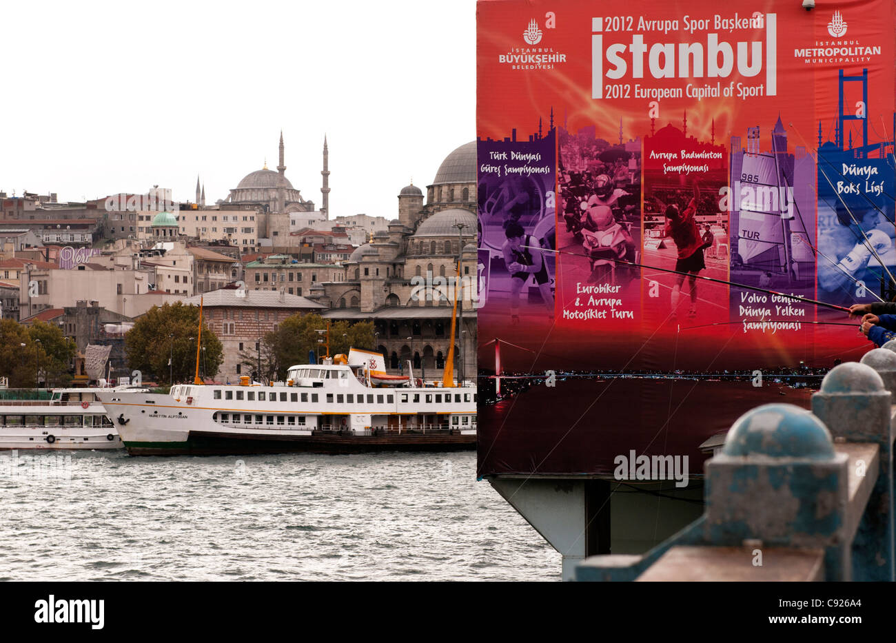 "Istanbul 2012 European Capital of Sport" sign on the Galata Bridge, Istanbul, Turkey Stock Photo