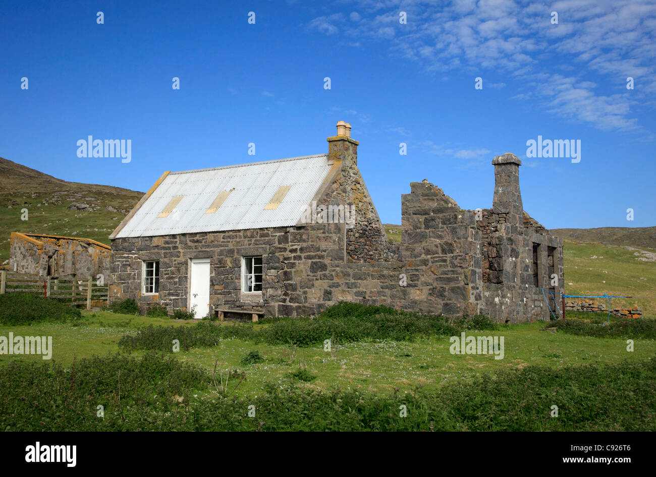 A stone house in a remote setting on the island of Mingulay in the Outer Hebrides, Scotland. Stock Photo
