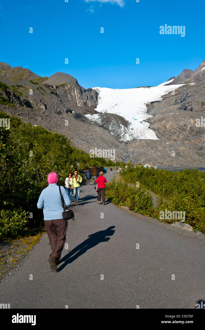 Tourist are seen walking on the Glacier Trail at Worthington Glacier State Recreation Area, Chugach National Forest, Alaska Stock Photo