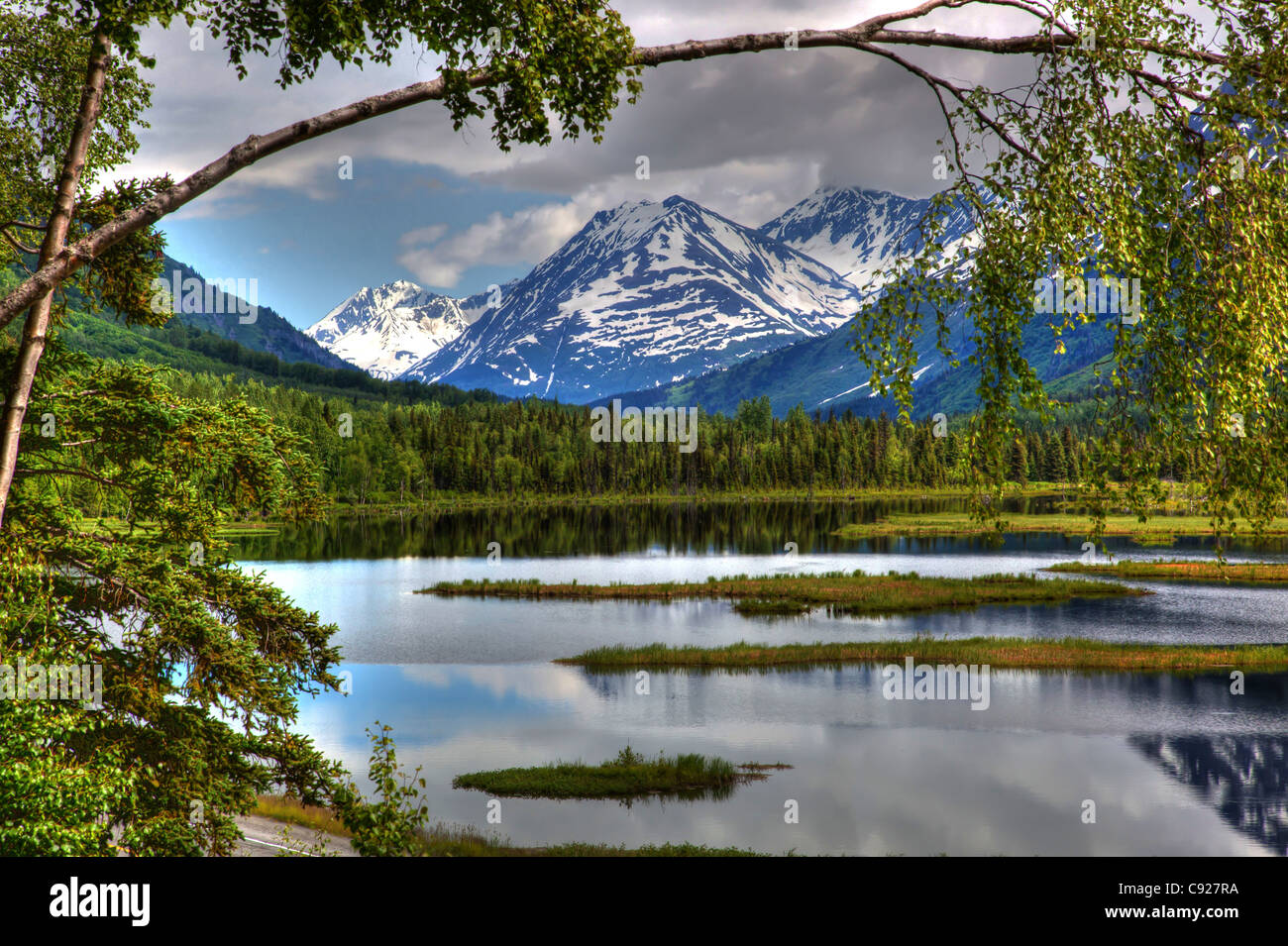 Scenic mountain and lake landscape along the Seward Highway, Kenai Peninsula, Southcentral Alaska, Summer, HDR Stock Photo