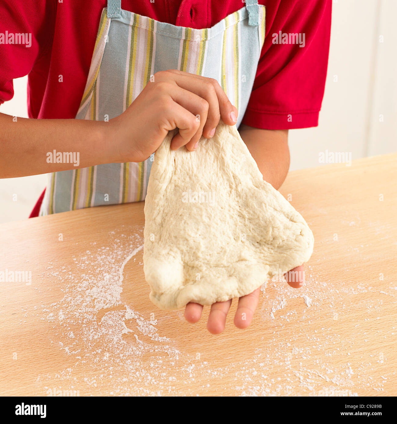 Kneading pizza dough Stock Photo Alamy
