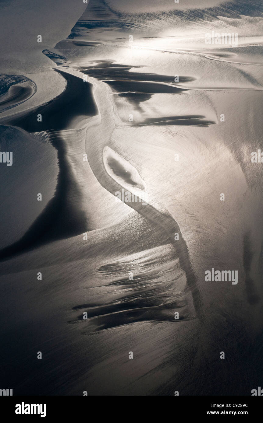 Aerial view of sunlight reflecting off the mud and silt of the Turnagain Arm, Southcentral Alaska, Summer Stock Photo