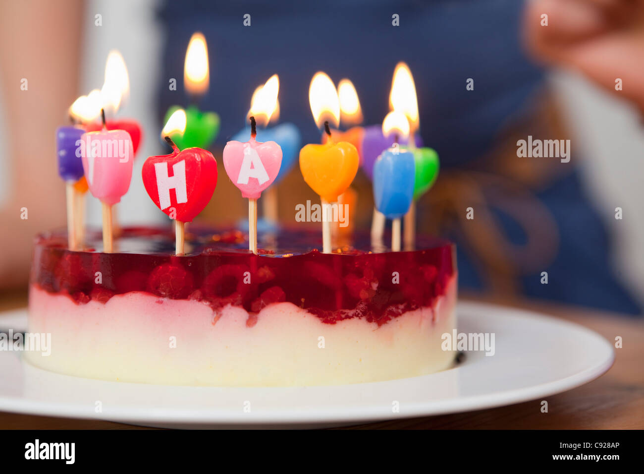 Close up of candles in birthday cake Stock Photo - Alamy