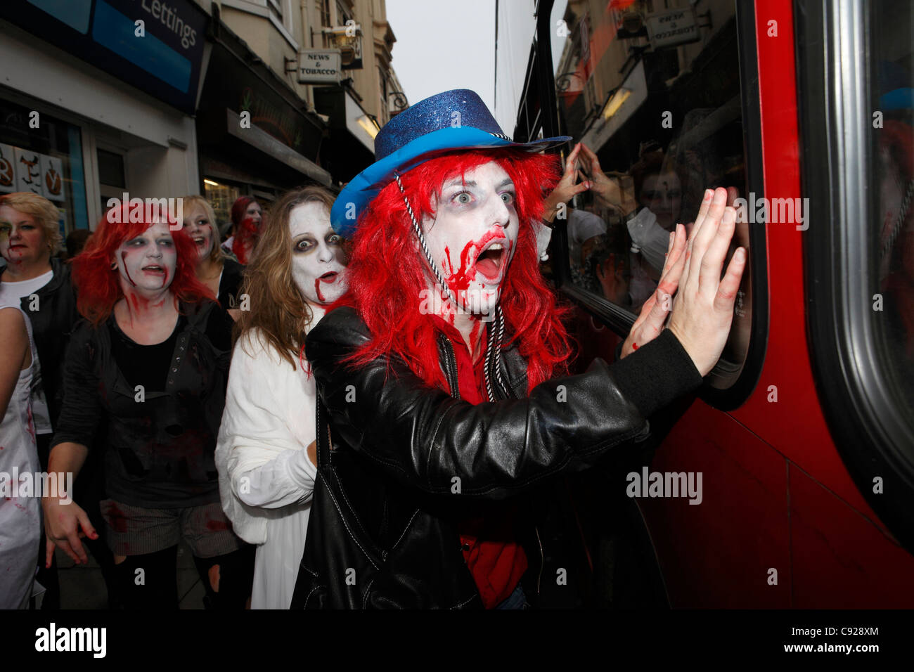 The quirky annual Zombie Walk held on an Autumn weekend, from the railway station to the beach in Brighton, East Sussex, England Stock Photo