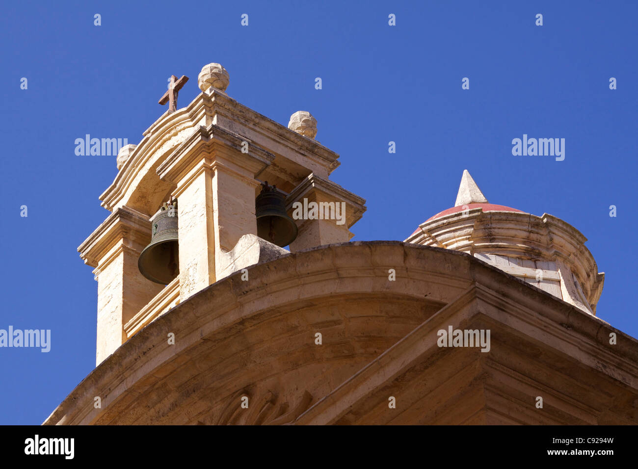 Church bell tower in Mdina's Citta Vecchia. Stock Photo