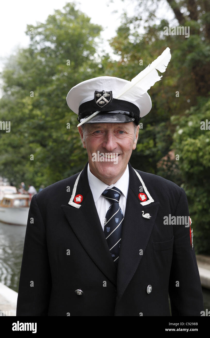 A portrait of the Queen's swan marker, seen at Hurley Lock during Swan Upping, River Thames, Henley, England Stock Photo