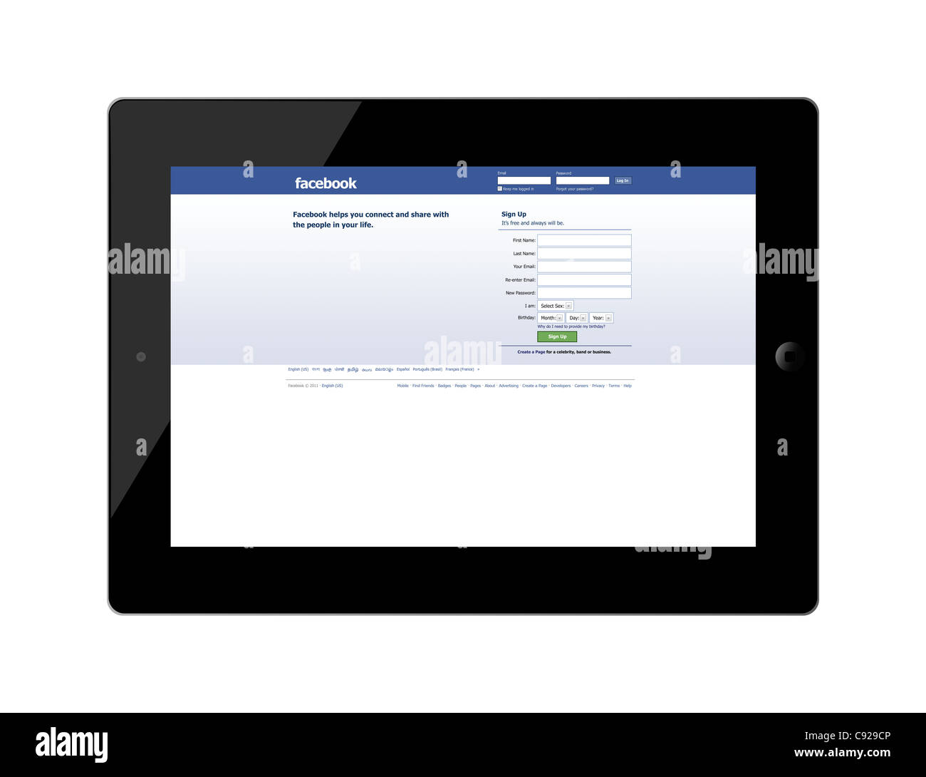 cutout Ipad2 displaying social network facebook homepage Stock Photo