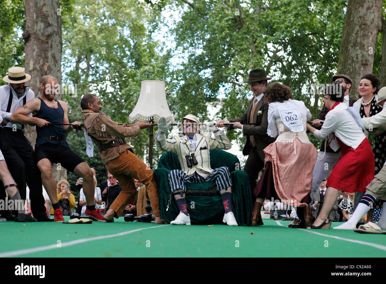 'Tug of Hair' at the quirky annual Chap Olympiad, held in Summer, Bedford Square Gardens in Bloomsbury, London, England Stock Photo