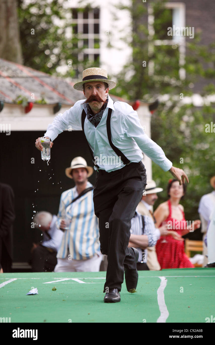 'Hop, Skip and G&T' at the quirky annual Chap Olympiad, held in Summer, Bedford Square Gardens in Bloomsbury, London, England Stock Photo