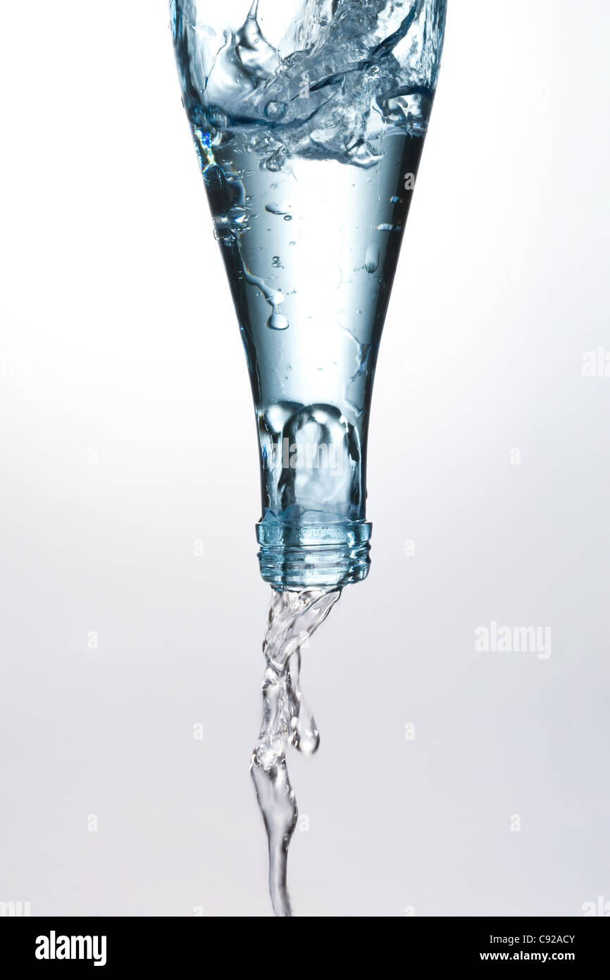 Water pouring from bottle Stock Photo Alamy